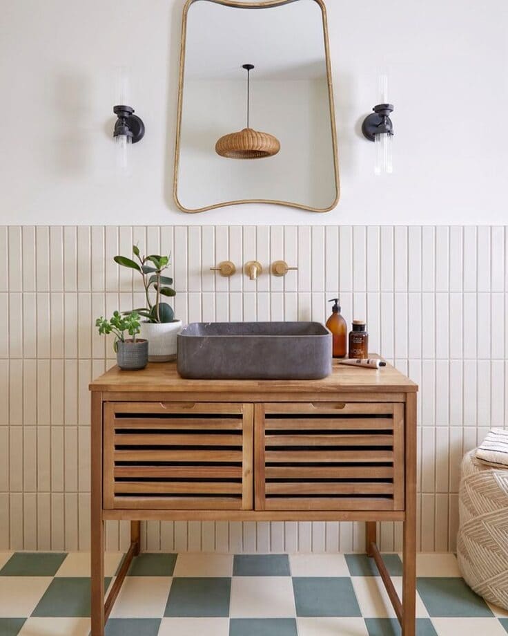  slatted wood vanity with vessel sink and checkered floor