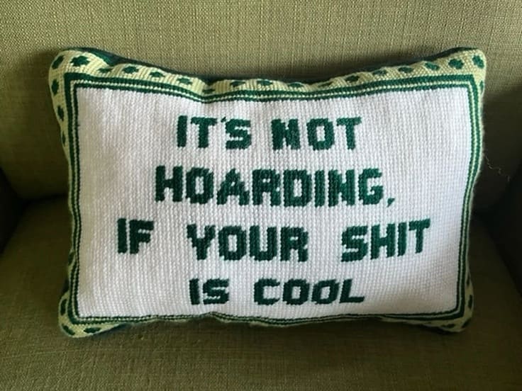 A playful embroidered pillow with a not-so-subtle truth
