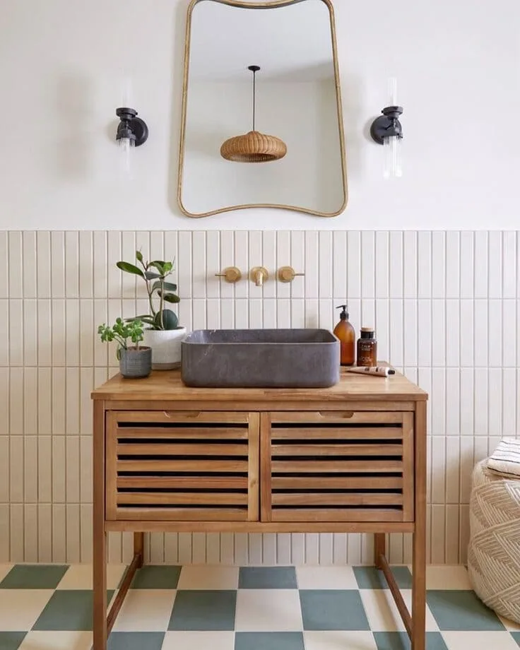  slatted wood vanity with vessel sink and checkered floor