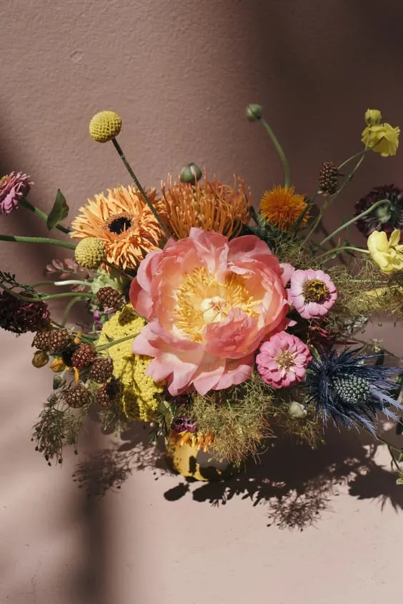 Vibrant moody bouquet of flowers wallpaper.