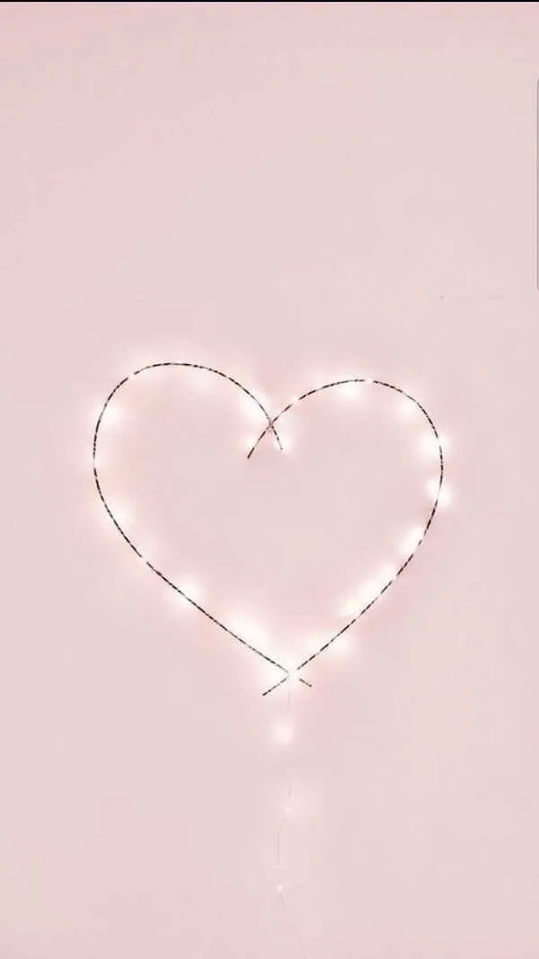 Pink pastel glowing heart mobile background